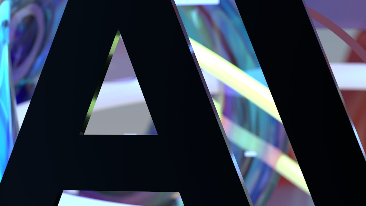 Partial view of dark ai letters over colorful abstract background.